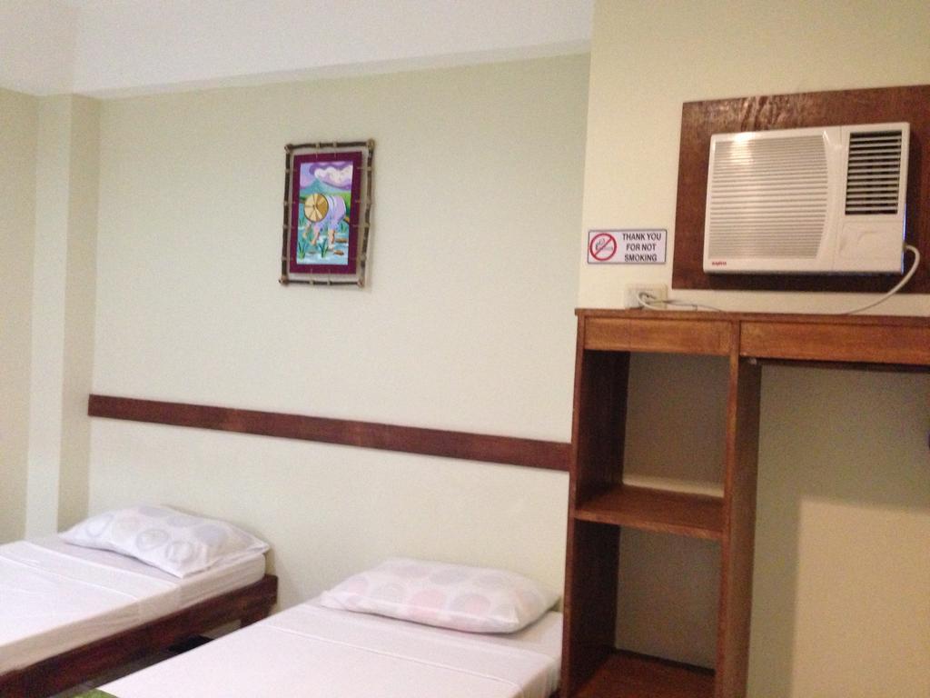 Qm Pension House Tagbilaran City Room photo